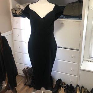 Black off the shoulders cocktail dress.
